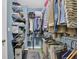 Organized walk-in closet with ample shelving and hanging space for clothing and accessories at 1304 Swallows Walk, Grayson, GA 30017