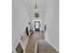 Front foyer featuring hardwood floors, a hanging chandelier and a grand entrance at 1304 Swallows Walk, Grayson, GA 30017