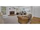 Spacious living room with fireplace and comfortable seating at 1304 Swallows Walk, Grayson, GA 30017