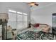 Bright and airy living room with vaulted ceiling and large windows at 1304 Swallows Walk, Grayson, GA 30017