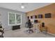 Bright home office featuring a desk, comfortable chair, and scenic outdoor views at 1304 Swallows Walk, Grayson, GA 30017