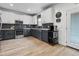 Modern kitchen with gray and white cabinets, stainless steel appliances, and sleek countertops at 1657 Bradmere Ln, Lithia Springs, GA 30122