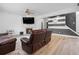 Comfortable living room with a fireplace, modern decor, and inviting seating at 1657 Bradmere Ln, Lithia Springs, GA 30122