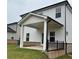 Backyard features a covered patio, ideal for outdoor relaxation at 2277 Whitworth St, Lawrenceville, GA 30044