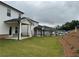 Backyards feature covered patios and landscaped grounds at 2277 Whitworth St, Lawrenceville, GA 30044