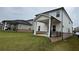 Well-manicured backyard with a covered patio, perfect for outdoor entertaining at 2277 Whitworth St, Lawrenceville, GA 30044
