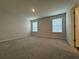 Large bedroom featuring neutral carpet and natural light at 2277 Whitworth St, Lawrenceville, GA 30044