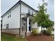 Charming two-story home with white siding and a covered front porch at 2277 Whitworth St, Lawrenceville, GA 30044