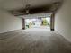 Clean, spacious garage with open door to view of home's exterior, offering convenience and security at 2277 Whitworth St, Lawrenceville, GA 30044