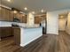Bright kitchen with large island, stainless steel appliances, and custom cabinetry at 2277 Whitworth St, Lawrenceville, GA 30044