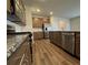 Modern kitchen with granite countertops, stainless steel appliances, and tile backsplash at 2277 Whitworth St, Lawrenceville, GA 30044