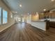 Spacious living room features modern hardwood floors, recessed lighting and an open floorplan at 2277 Whitworth St, Lawrenceville, GA 30044