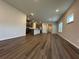 Open-concept living area boasts hardwood floors, recessed lights, and neutral wall paint at 2277 Whitworth St, Lawrenceville, GA 30044
