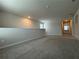 Open loft space with carpet and natural light at 2277 Whitworth St, Lawrenceville, GA 30044