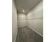 Spacious walk-in closet with carpeting and wire shelving providing ample storage space at 2277 Whitworth St, Lawrenceville, GA 30044