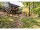 Expansive backyard featuring a covered deck and lush greenery, perfect for outdoor entertaining at 2849 Crescendo Dr, Atlanta, GA 30318