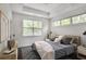 Cozy bedroom with natural light, modern decor, and stylish furnishings for comfortable living at 4202 Deming Cir, Sandy Springs, GA 30342