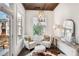 Cozy sitting room with hardwood floors, accent lighting, and exterior view at 4202 Deming Cir, Sandy Springs, GA 30342