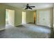 Bright bedroom with large closet, neutral walls and carpeting, and bright natural light at 4970 Clubgreen Smt, Stone Mountain, GA 30088
