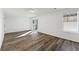 Finished basement with wood flooring, natural light, and sliding glass door to back yard at 2139 Logan Dr, Jonesboro, GA 30236