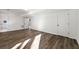 Finished basement with wood flooring, and access to updated bathroom at 2139 Logan Dr, Jonesboro, GA 30236