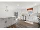 Bright kitchen with stainless steel appliances, modern white cabinets, and island at 2139 Logan Dr, Jonesboro, GA 30236