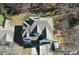 Aerial view of a multi-story home with an intricate roofline, surrounded by mature trees and parked vehicles at 3265 Greenhill Ct, Villa Rica, GA 30180