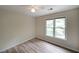 Well-lit bedroom with a ceiling fan and a window that provides natural light at 3265 Greenhill Ct, Villa Rica, GA 30180