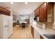 Bright eat-in kitchen with stainless appliances, white countertops, and tile floor at 3265 Greenhill Ct, Villa Rica, GA 30180