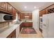 Updated kitchen featuring white countertops, stainless appliances, and tile flooring at 3265 Greenhill Ct, Villa Rica, GA 30180