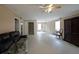 Spacious living room with a comfortable couch, neutral paint, and a variety of entryways at 3265 Greenhill Ct, Villa Rica, GA 30180