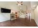 Bright living room with high ceilings, fireplace, hardwood floors, and staircase at 3265 Greenhill Ct, Villa Rica, GA 30180