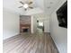 Open concept living room with hardwood flooring, stone fireplace, recessed lighting, and ceiling fan at 3265 Greenhill Ct, Villa Rica, GA 30180