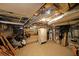 Unfinished basement space ready for customization with exposed pipes, a water heater, and appliances at 3265 Greenhill Ct, Villa Rica, GA 30180