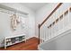 Entryway featuring a hardwood floor, coat rack, and a bench with shoe storage at 3690 Lambert Ne Ln, Atlanta, GA 30319