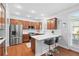 Modern kitchen boasts stainless steel appliances, white countertops and a breakfast bar at 3690 Lambert Ne Ln, Atlanta, GA 30319