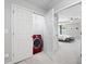 This primary bedroom features a red washer/dryer in the ensuite closet at 3690 Lambert Ne Ln, Atlanta, GA 30319
