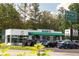 Henri's Bakery & Deli storefront with outdoor seating and ample parking available at 3690 Lambert Ne Ln, Atlanta, GA 30319