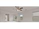 Spacious bedroom with natural light, ceiling fan, and neutral decor at 4117 Flat Rock Pt, Stonecrest, GA 30038