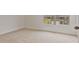 Bright bedroom with neutral walls and a window overlooking the neighborhood at 4117 Flat Rock Pt, Stonecrest, GA 30038