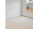 Bright bedroom with a window showing the exterior of the home at 4117 Flat Rock Pt, Stonecrest, GA 30038