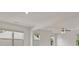 Bright living room featuring large windows and a ceiling fan at 4117 Flat Rock Pt, Stonecrest, GA 30038