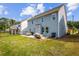 Large, fenced backyard featuring a patio and lawn area at 639 Tigers Eye Ter, Kennesaw, GA 30144