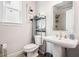 Well-lit bathroom with a modern sink, fixtures, and a view of the shower and window at 639 Tigers Eye Ter, Kennesaw, GA 30144