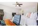 Bedroom featuring neutral walls, plush carpet, a bed with pillows and work area at 639 Tigers Eye Ter, Kennesaw, GA 30144