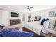 Bright and spacious bedroom features neutral walls, a ceiling fan, and workout equipment at 639 Tigers Eye Ter, Kennesaw, GA 30144