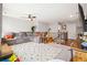 Fun bonus room with a sectional, TV, and a playful design perfect for relaxation and entertainment at 639 Tigers Eye Ter, Kennesaw, GA 30144