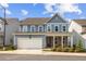 Charming two-story home with a covered front porch and two car garage at 639 Tigers Eye Ter, Kennesaw, GA 30144