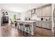 Open concept kitchen with white countertops and light grey cabinetry at 639 Tigers Eye Ter, Kennesaw, GA 30144