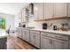 Spacious kitchen features a full wall of white subway tile at 639 Tigers Eye Ter, Kennesaw, GA 30144